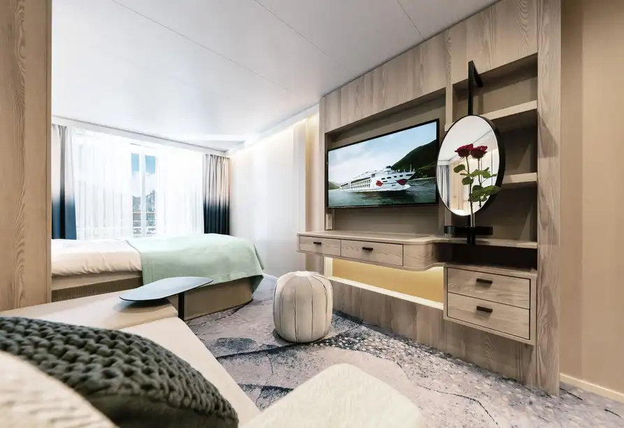 Ein Wohnzimmer mit einem Blick auf den Fluss und die Niederlande